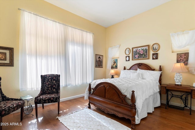 bedroom featuring wood-type flooring