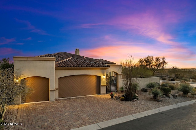 view of front of home with a garage