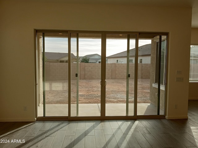 doorway featuring hardwood / wood-style floors