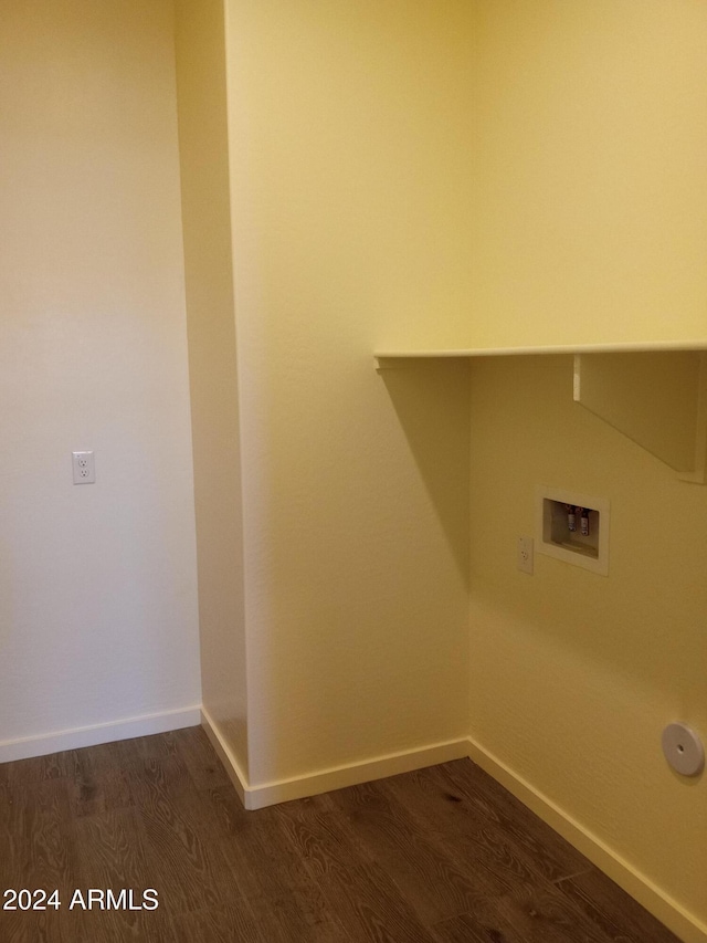 clothes washing area featuring hookup for a washing machine and hardwood / wood-style flooring