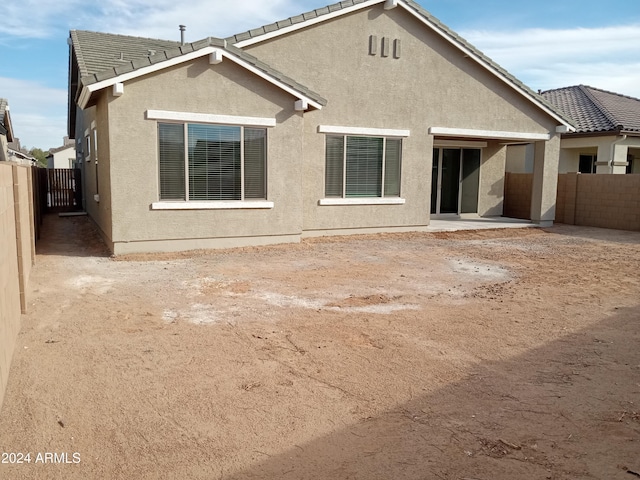 back of house featuring a patio area