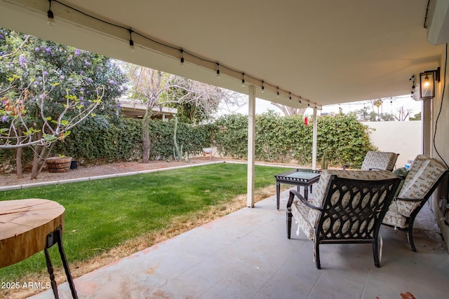 view of patio / terrace with outdoor dining area and fence