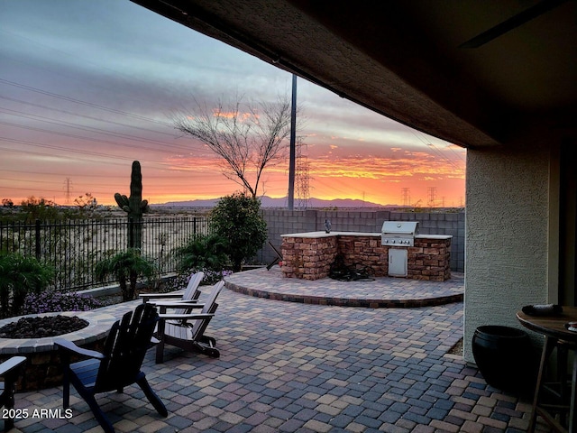 10637 W Eucalyptus Rd, Peoria, AZ 85383 - fenced backyard with a fire pit and a patio area
