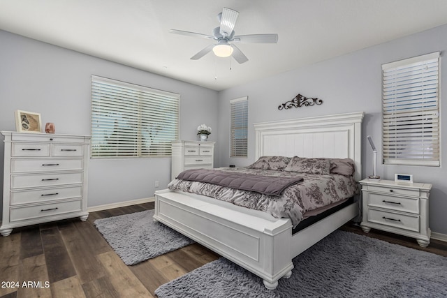 10637 W Eucalyptus Rd, Peoria, AZ 85383 - bedroom with baseboards, dark wood-style floors, and ceiling fan