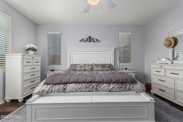 10637 W Eucalyptus Rd, Peoria, AZ 85383 - bedroom with dark wood-style floors, a ceiling fan, and baseboards