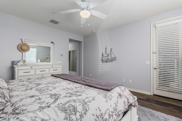 10637 W Eucalyptus Rd, Peoria, AZ 85383 - bedroom featuring dark wood-type flooring, ceiling fan, baseboards, and lofted ceiling