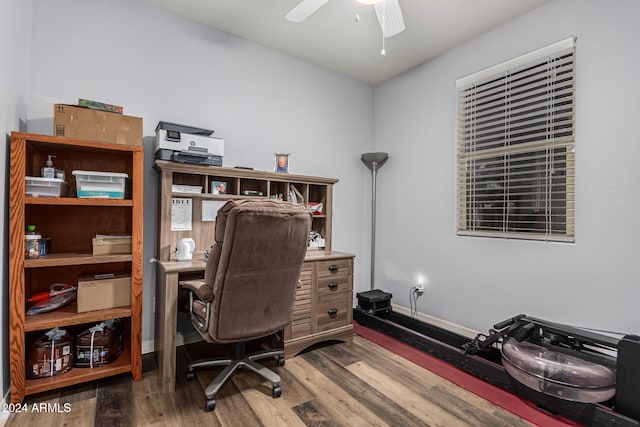 office area with ceiling fan, wood finished floors, and baseboards