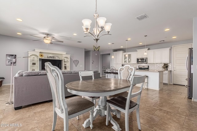 10637 W Eucalyptus Rd, Peoria, AZ 85383 - dining space with recessed lighting, ceiling fan, and a chandelier