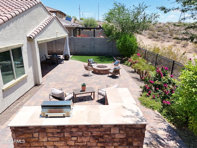10637 W Eucalyptus Rd, Peoria, AZ 85383 - fenced backyard with a fire pit and a patio area