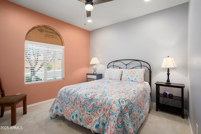carpeted bedroom featuring recessed lighting, baseboards, and a ceiling fan