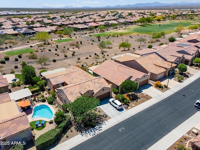 drone / aerial view with a residential view and a mountain view
