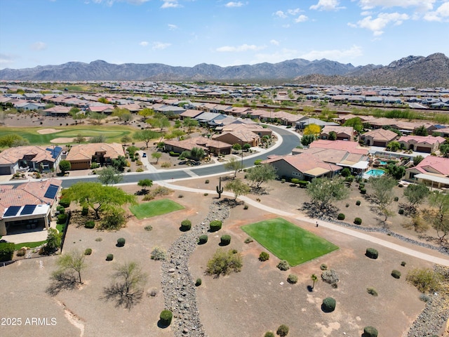 bird's eye view with a residential view and a mountain view