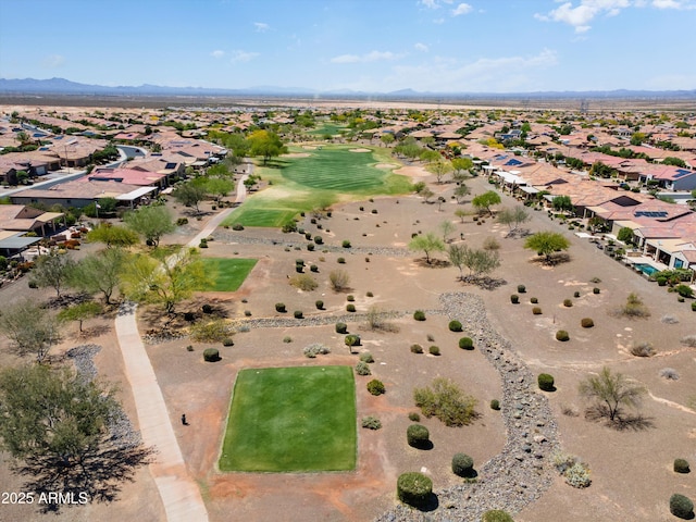 aerial view featuring a residential view, a mountain view, and view of golf course