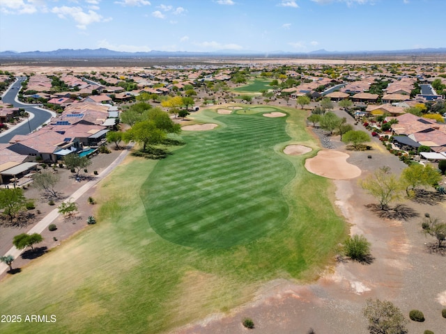 birds eye view of property featuring a residential view, a mountain view, and golf course view
