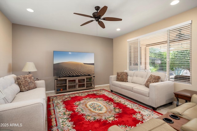 living area with baseboards, recessed lighting, carpet, and ceiling fan