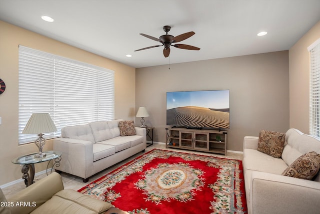 living area featuring baseboards, recessed lighting, and ceiling fan