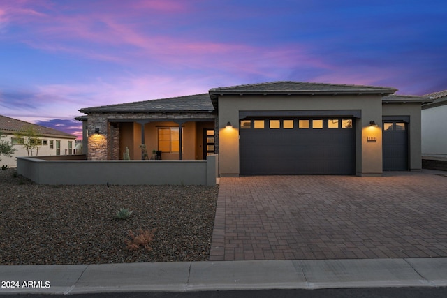 prairie-style home with a garage