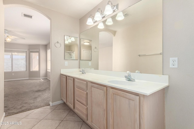 1625 E Daisy St, Casa Grande, AZ 85122 - full bath featuring tile patterned floors, baseboards, double vanity, and ceiling fan