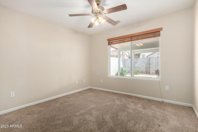 1625 E Daisy St, Casa Grande, AZ 85122 - unfurnished room with carpet, baseboards, and ceiling fan