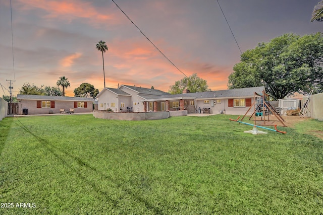 5621 N 13th St, Phoenix, AZ 85014 - rear view of property featuring a patio area