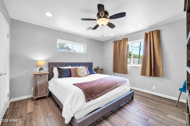 5621 N 13th St, Phoenix, AZ 85014 - bedroom with hardwood / wood-style floors, baseboards, recessed lighting, and a ceiling fan