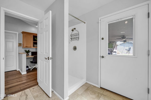 5621 N 13th St, Phoenix, AZ 85014 - bathroom featuring a stall shower and baseboards