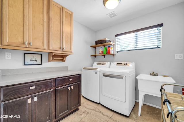 5621 N 13th St, Phoenix, AZ 85014 - washroom featuring washing machine and clothes dryer and cabinet space