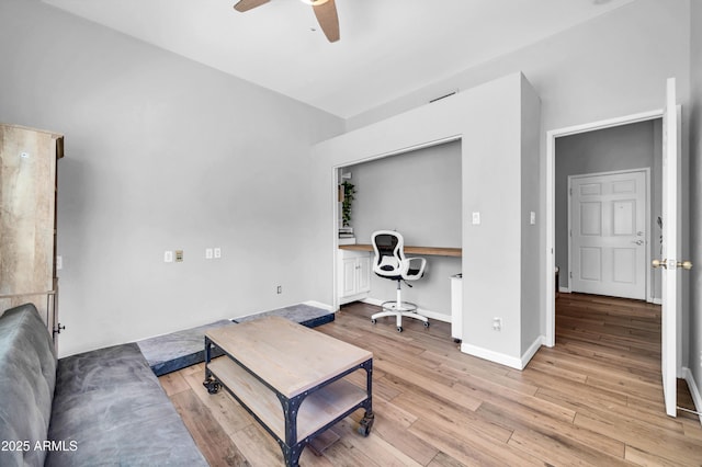 5621 N 13th St, Phoenix, AZ 85014 - office area with ceiling fan, built in study area, light wood-type flooring, and baseboards