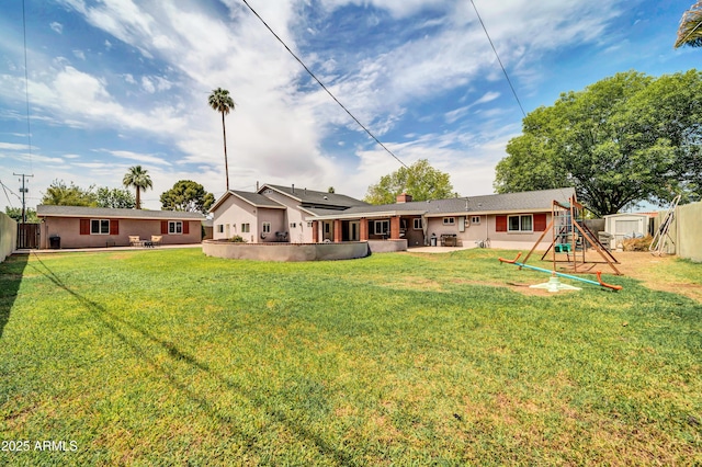 5621 N 13th St, Phoenix, AZ 85014 - rear view of property featuring a patio and stucco siding