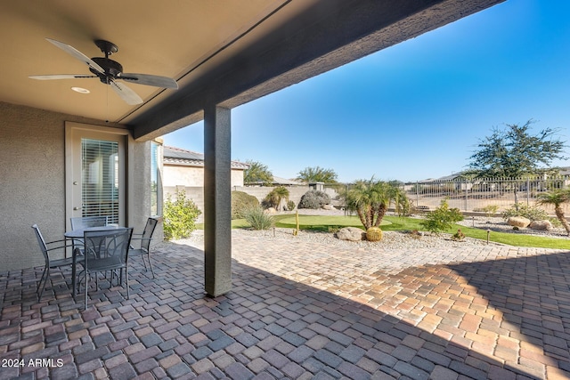 view of patio / terrace featuring ceiling fan