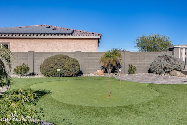 view of home's community with a patio area