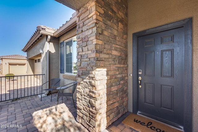 entrance to property featuring a porch