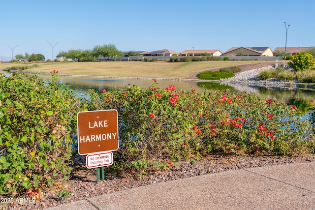 surrounding community featuring a water view