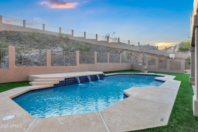 view of swimming pool featuring a fenced in pool and a fenced backyard