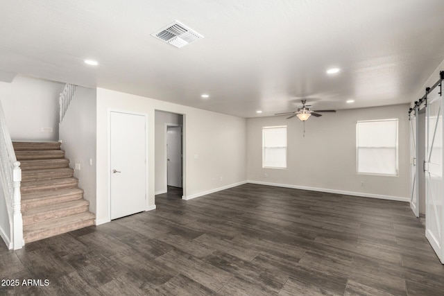 6637 W Watkins St, Phoenix, AZ 85043 - unfurnished living room with a barn door, recessed lighting, stairs, a ceiling fan, and baseboards