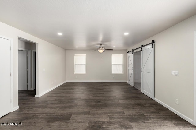6637 W Watkins St, Phoenix, AZ 85043 - unfurnished bedroom with recessed lighting, a barn door, baseboards, dark wood-style floors, and ceiling fan