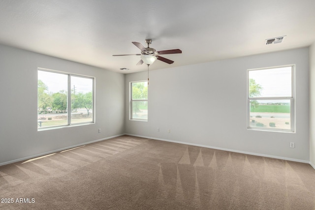 6637 W Watkins St, Phoenix, AZ 85043 - carpeted empty room with a ceiling fan and baseboards