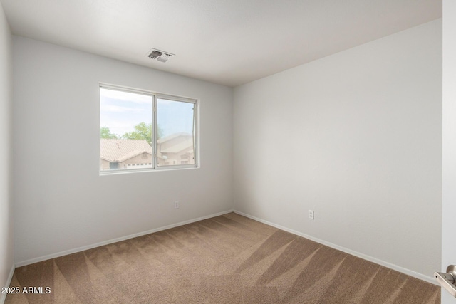 6637 W Watkins St, Phoenix, AZ 85043 - spare room featuring carpet flooring and baseboards