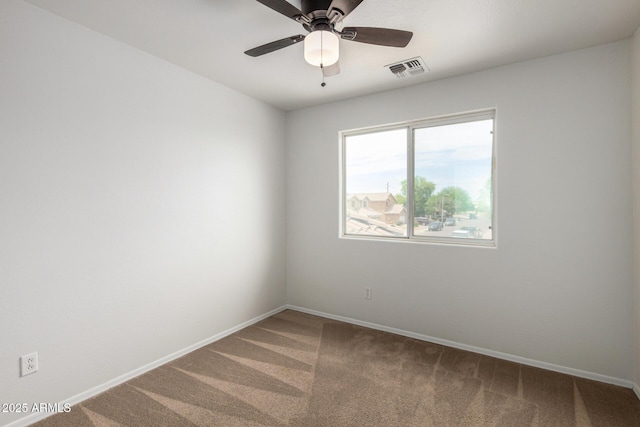 6637 W Watkins St, Phoenix, AZ 85043 - carpeted spare room with baseboards and a ceiling fan