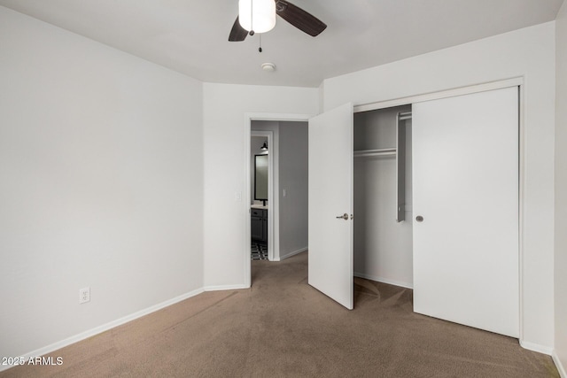 6637 W Watkins St, Phoenix, AZ 85043 - unfurnished bedroom featuring carpet flooring, baseboards, a closet, and a ceiling fan