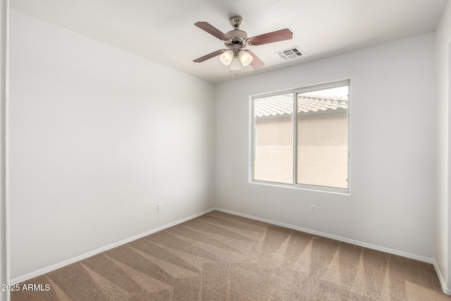 6637 W Watkins St, Phoenix, AZ 85043 - empty room with carpet, a ceiling fan, and baseboards
