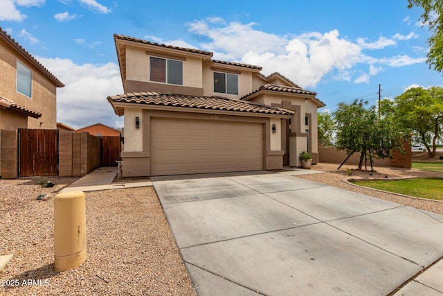 6637 W Watkins St, Phoenix, AZ 85043 - mediterranean / spanish-style house featuring stucco siding, driveway, and a tiled roof
