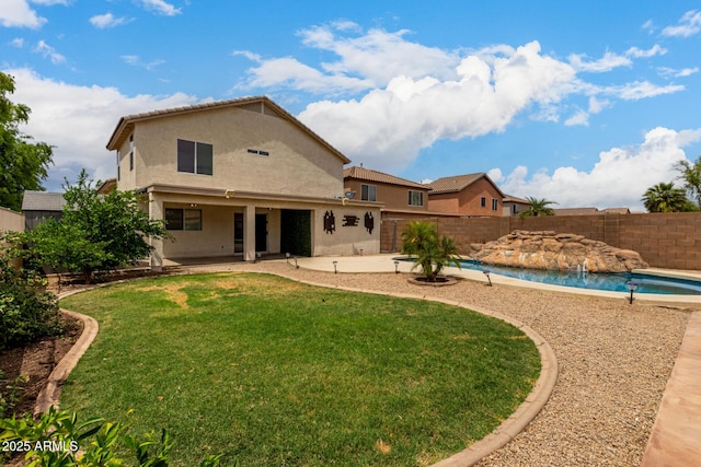 6637 W Watkins St, Phoenix, AZ 85043 - back of property featuring a patio area and stucco siding