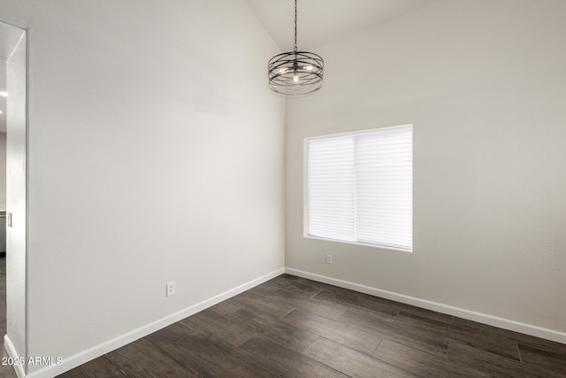 6637 W Watkins St, Phoenix, AZ 85043 - empty room with dark wood-style flooring, a chandelier, baseboards, and lofted ceiling