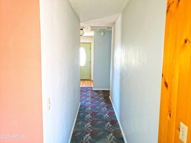 69762 Old Bell Rd, Salome, AZ 85348 - hall with a textured ceiling and baseboards
