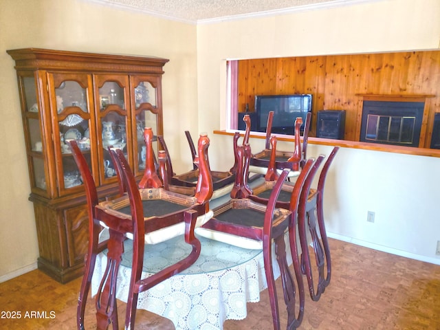 69762 Old Bell Rd, Salome, AZ 85348 - dining room with baseboards, ornamental molding, and a textured ceiling