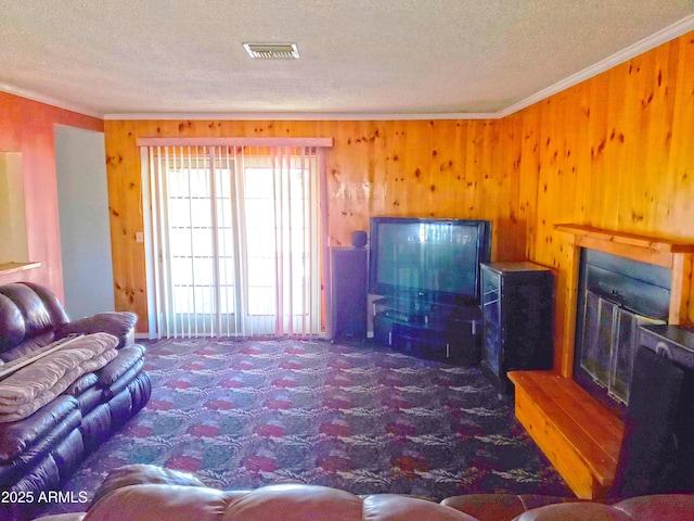 69762 Old Bell Rd, Salome, AZ 85348 - carpeted living room featuring a textured ceiling, wood walls, and ornamental molding