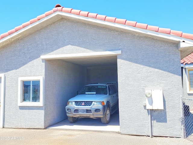 69762 Old Bell Rd, Salome, AZ 85348 - view of side of home with stucco siding and a tiled roof