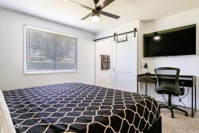 2041 E Harvard Dr, Tempe, AZ 85283 - bedroom featuring a barn door, ceiling fan, and carpet