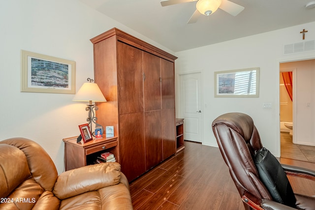 office area with dark hardwood / wood-style floors and ceiling fan